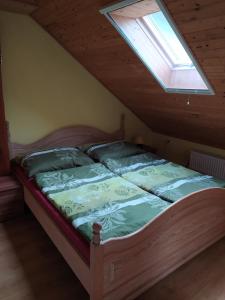 Postel nebo postele na pokoji v ubytování penzion Poutník
