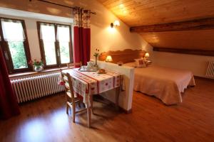Postel nebo postele na pokoji v ubytování Hotel Aiguille Noire