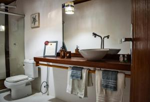 Kylpyhuone majoituspaikassa Barra Suítes
