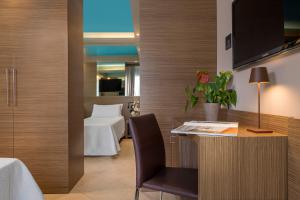 TV a/nebo společenská místnost v ubytování Hotel Adlon - FRONTE MARE