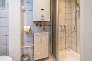 Ванная комната в Hochfügenblick-erholung für Zwei