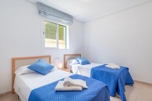 Postel nebo postele na pokoji v ubytování Apartment Es Mirador 2 + 20 fotografií
