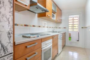 Kuchyň nebo kuchyňský kout v ubytování Apartment Es Mirador 2