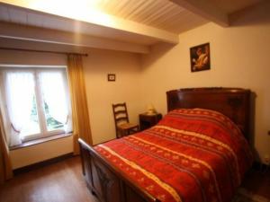 En eller flere senge i et værelse på Gîte Beaufremont, 3 pièces, 5 personnes - FR-1-589-21