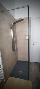 a shower with a glass door in a bathroom at Dianostellamarina in Diano Marina +60 photos