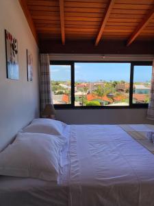 Postel nebo postele na pokoji v ubytování Canto Leste Pousada