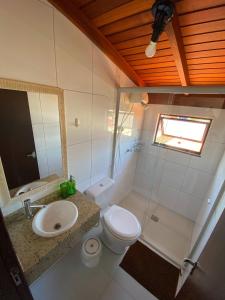 A bathroom at Canto Leste Pousada