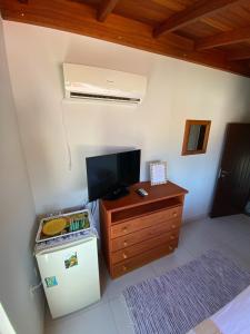 TV a/nebo společenská místnost v ubytování Canto Leste Pousada