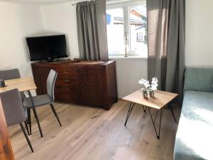 Televízia a/alebo spoločenská miestnosť v ubytovaní Hanna`s Home