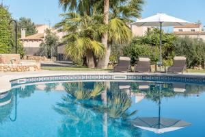 The swimming pool at or close to Finca Ca'n Puig