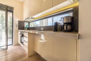 Kép Luxury 3 Bedroom Apartment with garden in Glyfada szállásáról Athénban a galériában