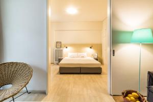 Posteľ alebo postele v izbe v ubytovaní One-Bedroom Apartment - Kolonaki