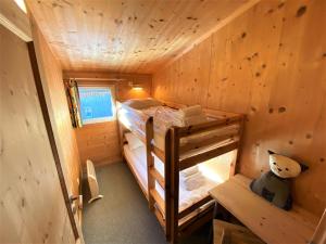 Postel nebo postele na pokoji v ubytování EXCLUSIVES Chalet an der SKIPISTE +Dampfbad +NETFLIX