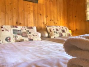 Postel nebo postele na pokoji v ubytování EXCLUSIVES Chalet an der SKIPISTE +Dampfbad +NETFLIX