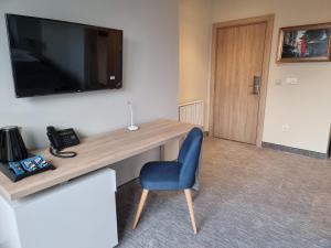 TV a/nebo společenská místnost v ubytování Hotel Skadarlija NB