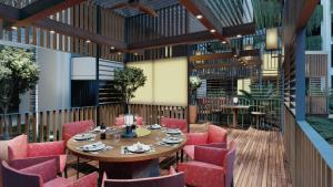 a rendering of a restaurant with a table and chairs at Paradisus Cancun All Inclusive in Cancún