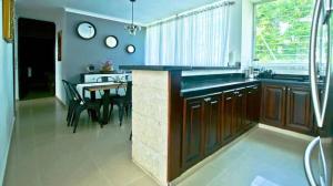 Kuchyň nebo kuchyňský kout v ubytování Nice Apartment in Santiago, Near Popular Places
