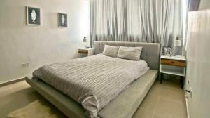 Postel nebo postele na pokoji v ubytování Nice Apartment in Santiago, Near Popular Places