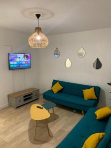 Χώρος καθιστικού στο L EFFET MER 70M2 avec 2 chambres doubles avec Parking 1 voiture GRATUIT, Netflix Disney plus disponible Lits faits à l arrivé Serviettes de toilettes fournies