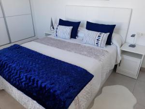 A bed or beds in a room at Marina Senator