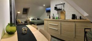 TV a/nebo společenská místnost v ubytování Apartament Wrzosowa 25