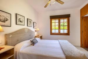 Posteľ alebo postele v izbe v ubytovaní Villa Vora Puerto Pollensa by JS Villas
