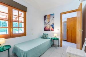 Posteľ alebo postele v izbe v ubytovaní Villa Vora Puerto Pollensa by JS Villas