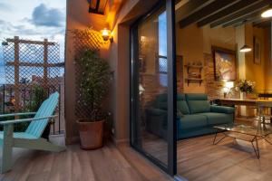 Ein Sitzbereich in der Unterkunft Priorat Aparthotel