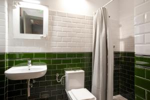 Ein Badezimmer in der Unterkunft Priorat Aparthotel