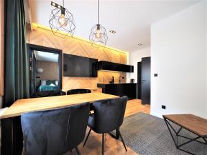 Kuchyňa alebo kuchynka v ubytovaní VIP Apartamenty Gorące Źródła