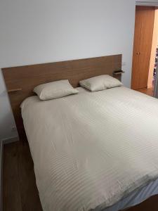 Ένα ή περισσότερα κρεβάτια σε δωμάτιο στο Melissa Home