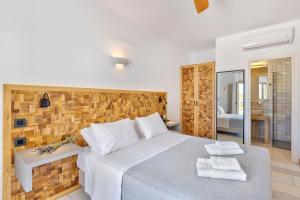 Postel nebo postele na pokoji v ubytování Calma Boutique Hotel