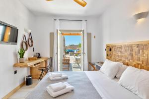 Postel nebo postele na pokoji v ubytování Calma Boutique Hotel