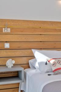 Postel nebo postele na pokoji v ubytování Calma Boutique Hotel
