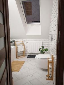 Koupelna v ubytování Apartament Wrzosowa 25 + 39 fotografií