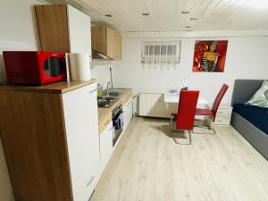 Ferienwohnung in Kuppenheim für 1 bis 2 Personen tesisinde mutfak veya mini mutfak