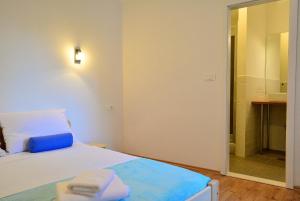 Posteľ alebo postele v izbe v ubytovaní Golden B&B