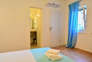 Posteľ alebo postele v izbe v ubytovaní Golden B&B