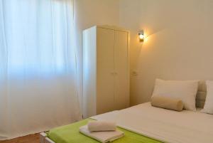 Posteľ alebo postele v izbe v ubytovaní Golden B&B