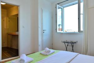 Posteľ alebo postele v izbe v ubytovaní Golden B&B