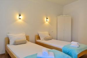 Postel nebo postele na pokoji v ubytování Golden B&B