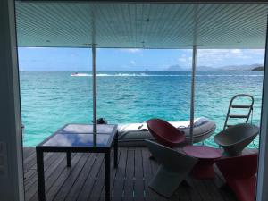 a view of the ocean from the back of a boat at Aqualodge Martinique in Le Marin