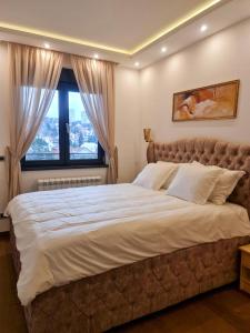 Posteľ alebo postele v izbe v ubytovaní Lumia Spa