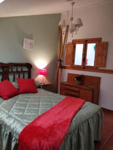 Postel nebo postele na pokoji v ubytování CASA RURAL EL CAIDERÓN