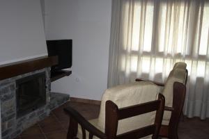 Televízia a/alebo spoločenská miestnosť v ubytovaní Nadal Apartaments