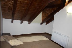 Posteľ alebo postele v izbe v ubytovaní Nadal Apartaments