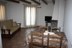 Televízia a/alebo spoločenská miestnosť v ubytovaní Nadal Apartaments