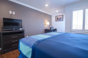 Katil atau katil-katil dalam bilik di Continental Inn