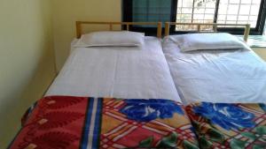 Letto o letti in una camera di Barve Homes