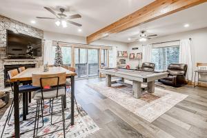 a living room with a ping pong table at Susquehana Luxury in South Lake Tahoe